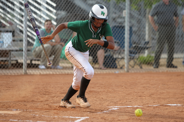 Palo Verde's Dejanae Gage (2) runs safe to first base after bunting the ball against Rancho at Rancho High School in Las Vegas Tuesday, March 17, 2015. Palo Verde won 10-0. (Erik Verduzco/Las Vega ...