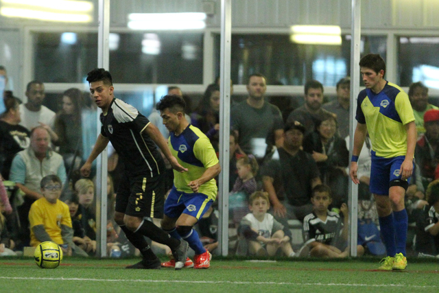 Las Vegas Legends Eric Guzman (7) dribbles the ball to find an open pass in a Major Arena Soccer League game against Sacramento Surge at the Las Vegas Sports Park on Feb. 22, 2015. Las Vegas Legen ...
