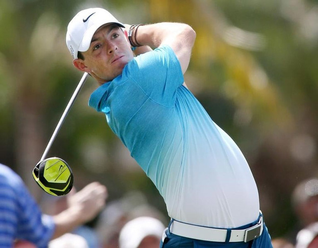 Rory McIlroy hits his tee shot on the twelfth hole during the first round of the WGC - Cadillac Championship golf tournament at TPC Blue Monster at Trump National Doral. (Jason Getz-USA TODAY Sports)
