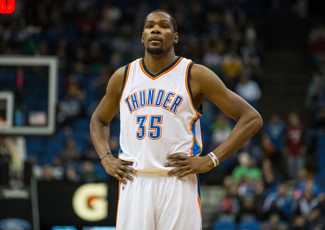 Dec 12, 2014; Minneapolis, MN, USA; Oklahoma City Thunder forward Kevin Durant (35) looks on during the fourth quarter against the Minnesota Timberwolves at Target Center. The Thunder defeated the ...