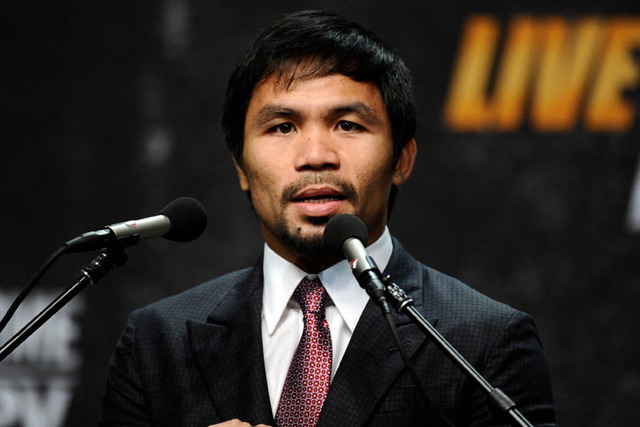 Mar 11, 2015; Los Angeles, CA, USA; Manny Pacquiao during a press conference to announce his fight with Floyd Mayweather fight on May 2, 2015 at Los Angeles. (Robert Hanashiro-USA TODAY Sports)