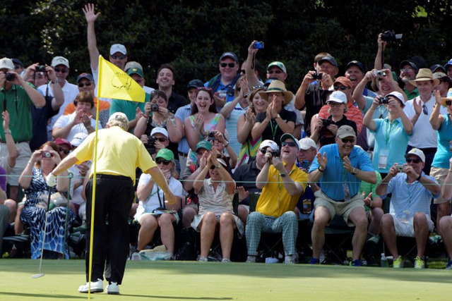 Apr 8, 2015; Augusta, GA, USA; Jack Nicklaus takes a bow for the gallery on the 3rd green during the Par 3 Contest prior to the 2015 The Masters golf tournament at Augusta National Golf Club. Mic ...