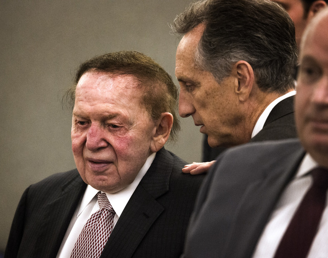 Las Vegas Sands Corp. Chairman and CEO Sheldon Adelson, left, and his attorney John Randall Jones before he testified at Clark County Justice Center on Tuesday, April 28,2015.  Steven Jacobs, form ...