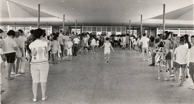 Fans of the British rock 'n' roll band The Beatles line up to purchase concert tickets at the Las Vegas Convention Center, June 29, 1964. The group, which has inspired a certain amount of fanatici ...