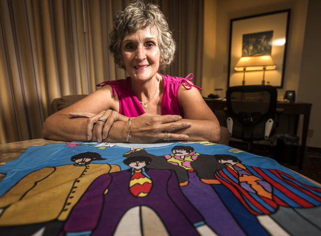 Christie Mullikin Jones, seen here with a T-shirt featuring the Beatles of a later era, saw the Beatles play Las Vegas on Aug. 20, 1964 and remains a lifelong fan. (Jeff Scheid/Las Vegas Review-Jo ...
