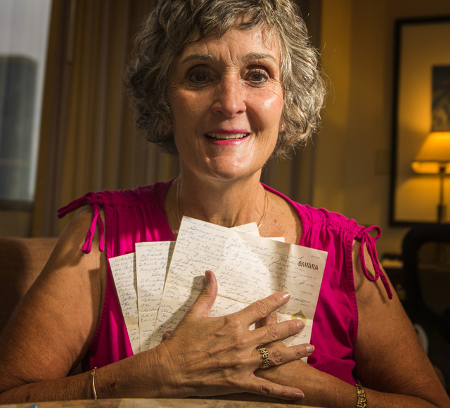Christie Mullikin Jones holds three letters that she wrote to her friend 50 years ago when her family came to Las Vegas to see the Beatles play at the Las Vegas Convention Center. (Jeff Scheid/Las ...