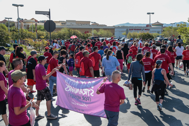 Participants walk the course during the Aid for AIDS of Nevada (AFAN) 25th Annual AIDS Walk Las Vegas at Town Square Las Vegas, South Las Vegas Boulevard,  Las Vegas, Sunday, April 19, 2015. (Dona ...