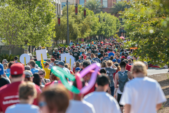 A large crowd of participants walk the course during the Aid for AIDS of Nevada (AFAN) 25th Annual AIDS Walk Las Vegas at Town Square Las Vegas, South Las Vegas Boulevard,  Las Vegas, Sunday, Apri ...