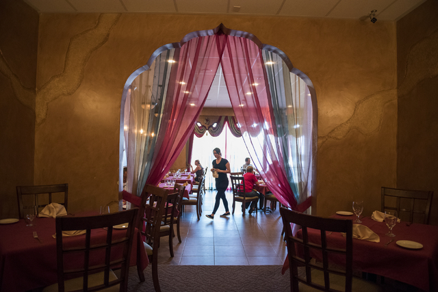 Customers dine inside Saffron Flavors of India March 27, 2015. (Martin S. Fuentes/View)