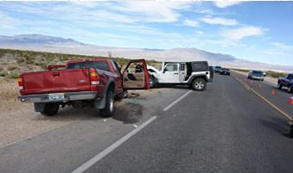A red Ford Ranger pickup driven by Gary Gray is shown in this photo provided by the Nevada Highway Patrol following a collision with the white Jeep Wrangler on Kyle Canyon Road on Thursday, April ...