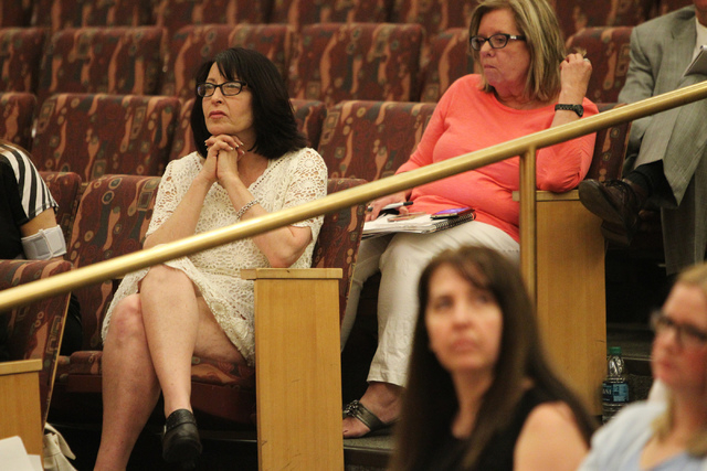 Julie Belshe, left, listens during a discussion on court-appointed guardianships at the Clark County Commission chambers in Las Vegas Tuesday, April 21, 2015. (Erik Verduzco/Las Vegas Review-Journ ...