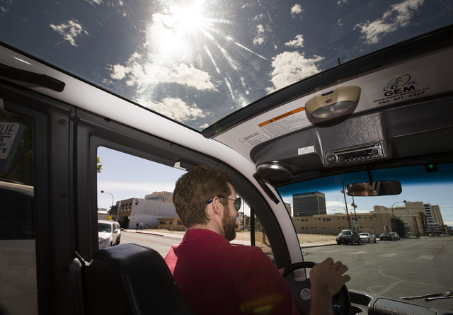 Resort Gaming Group project manager John Curran drives in downtown Las Vegas  on Thursday, April 16, 2015. Downtown Project will soon be renting small renovated apartments in the 315­-unit co ...