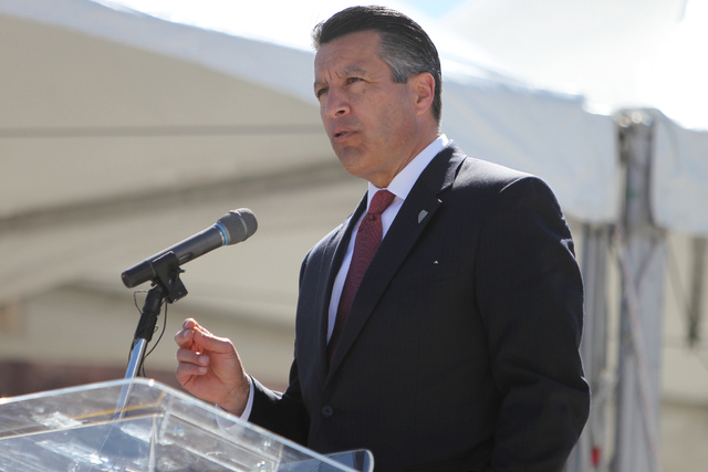 Nevada Gov. Brian Sandoval speaks during the ground breaking ceremony for the I-11 Boulder City bypass project in Boulder City, Nev., Monday, April 6, 2015. (Erik Verduzco/Las Vegas Review-Journal ...