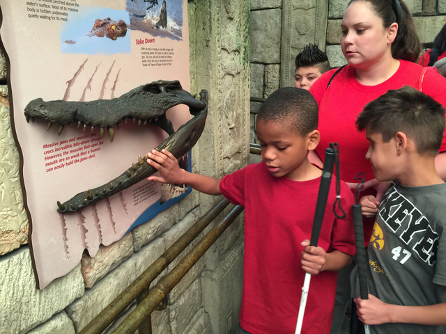 Nevada Blind Children’s Foundation students Christian Lowe and Dylan Diaz learn about crocodiles at Shark Reef at Mandalay Bay as part of a field trip during Nevada Blind Children’s Foundation ...