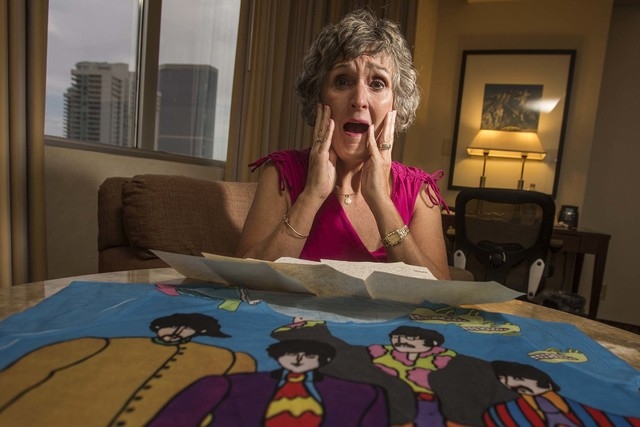 Christie Mullikin Jones re-enacts her experience of seeing the Beatles in concert 50 years ago at the Las Vegas Convention Center. She is photographed at her room at Westgate Las Vegas Resort on F ...