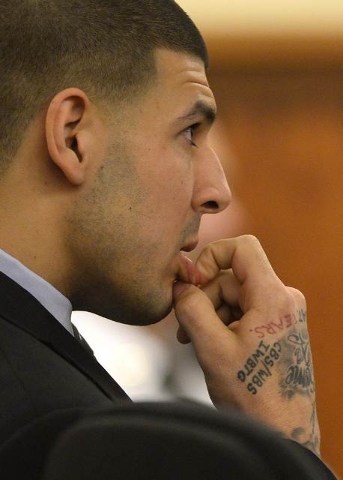 Former NFL player Aaron Hernandez listens during testimony in his murder trial in Fall River, Massachusetts  March 27, 2015. (REUTERS/CJ Gunther/Pool)