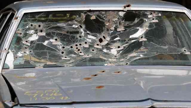 The windshield of Timmothy Russell's car is shown as the crime scene was mocked up for the court to review during the manslaughter trial for a police officer in Cleveland, Ohio April 10, 2015. Mic ...