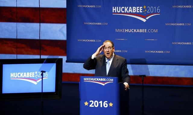 U.S. Republican presidential candidate and former Arkansas Governor Mike Huckabee salutes supporters as he formallly launches his bid for the 2016 Republican presidential nomination during an even ...