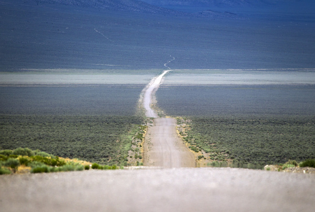 A barren road is seen Wednesday, May 20, 2015, in Garden Valley, over a three-hour drive north of Las Vegas. Over 800,000 acres in central Nevada is proposed as the Basin and Range National Monume ...