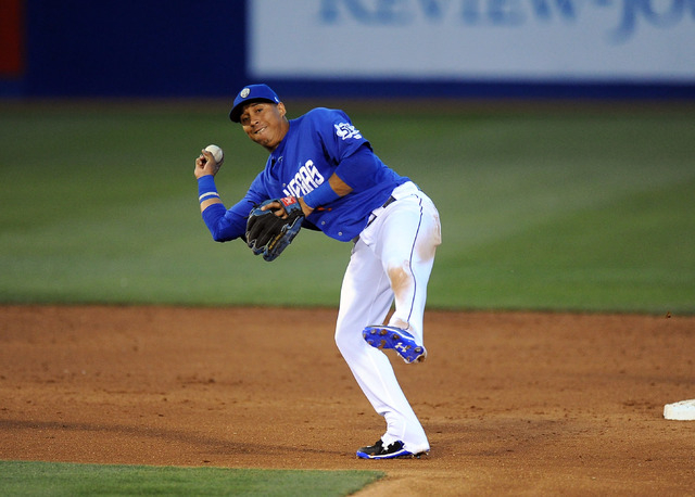 Las Vegas 51s second baseman Wilfredo Tovar throws out an Oklahoma City Dodgers base runner at first base in the third inning of their Triple-A minor league baseball game at Cashman Field in Las ...