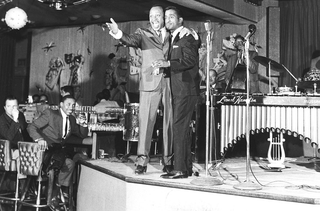 Performers Lionel Hampton, left, and Sammy Davis Jr. perform at the Riviera hotel-casino in Las Vegas, Dec. 2, 1963. (Las Vegas News Bureau)