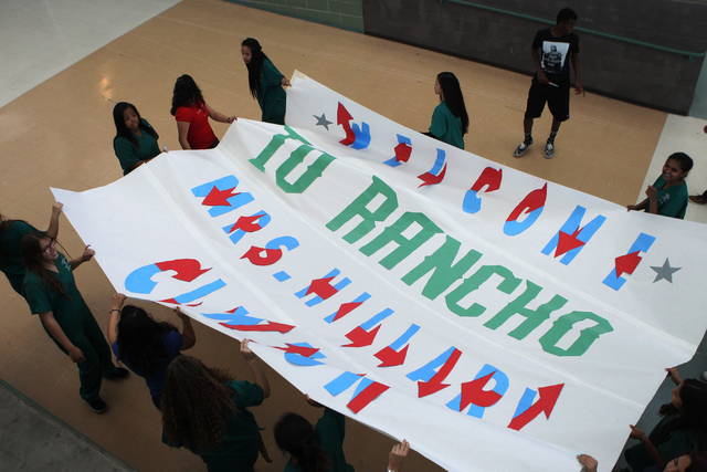 Students set up a banner inside Rancho High School in North Las Vegas for a campaign visit by Democratic presidential candidate Hillary Clinton Tuesday, May 5, 2015. (Erik Verduzco/Las Vegas Revie ...