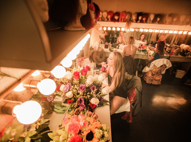 "Crazy Girls" dancer Lisa Cannon puts on makeup before the final show at the Riviera hotel-casino on Friday, May 1, 2015. After 28 years the show is closing and moving to Planet Hollywood. (Jeff S ...