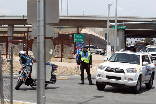 A Nevada Highway Patrol trooper closes the Martin Luther King Boulevard on-ramp to southbound Interstate 15 on Friday, May 22, 2015. A 4.8-magnitude earthquake shook Las Vegas and surrounding area ...