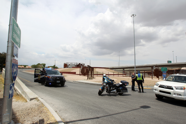 Nevada Highway Patrol troopers closes the Martin Luther King Boulevard on-ramp to southbound Interstate 15 on Friday, May 22, 2015. A 4.8-magnitude earthquake shook Las Vegas and surrounding areas ...