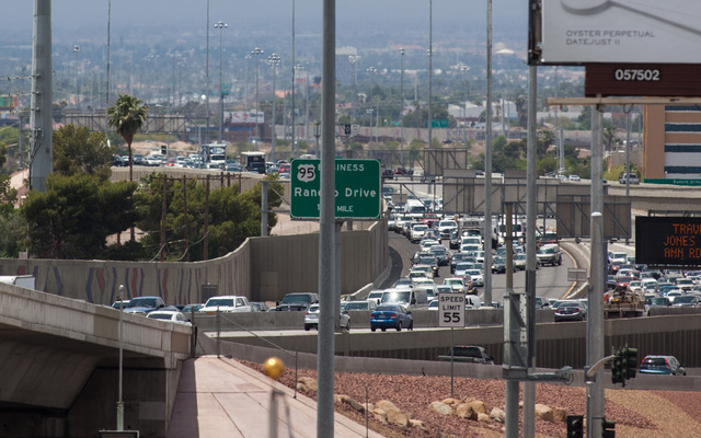 Traffic going southbound on U.S. Route 95 is seen backed up as officials from the Nevada Department of Transportation and Nevada Highway Patrol investigate possible damage on the ramp from southbo ...