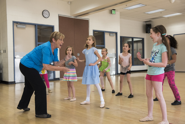 Dance instructor Lori Day, left, teaches her students, from left, Emmalina Spencer, 6, Kaylynn Spencer, 8, Julia Gardineer, 6, Aliana Gardineer, 8, and Alaina Michaelson, 8, how to tap dance at th ...