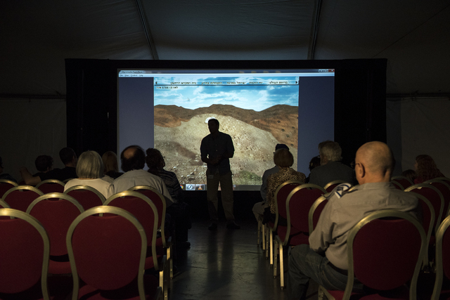 Patrons prepare to watch a short documentary film on the Western Wall during Israel Fest inside the Venetian hotel-casino in Las Vegas on Sunday, May 10, 2015. (Martin S. Fuentes/Las Vegas Review- ...