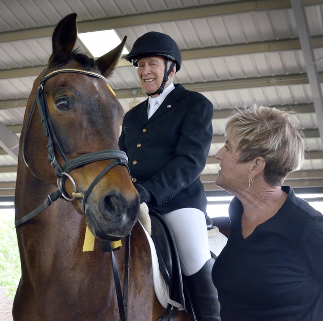 Ann King, right, is shown with Thann Hanchett, 79, and King's 21-year-old horse Magellan after the horse and rider completed a Century Ride at the Cooper Ranch at 6860 Rome Blvd. in Las Vegas on S ...