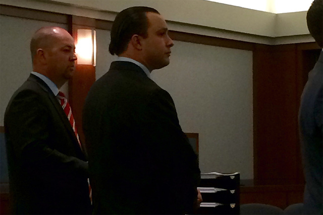 Former Metro detective Michael Kitchen, right, standing next to his attorney Roy Nelson, agrees to plead guilty Tuesday May 5, 2015 in connection with an alleged attack on a prostitute. (David Fer ...