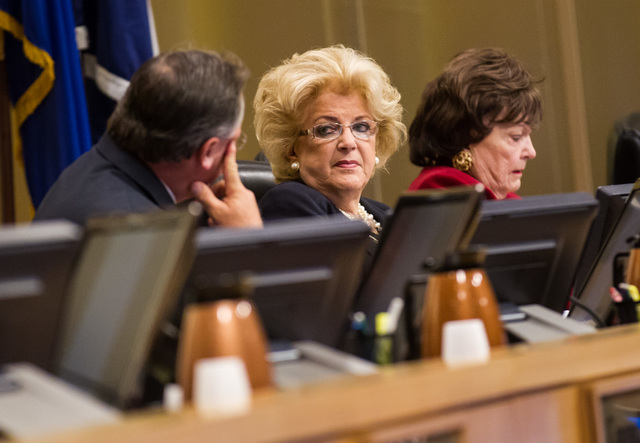 Mayor Carolyn Goodman, center, listens to Councilman Steve Ross, left, during discussion about raising the salary for city manager Betsy Fretwell during a city council meeting at Las Vegas City Ha ...