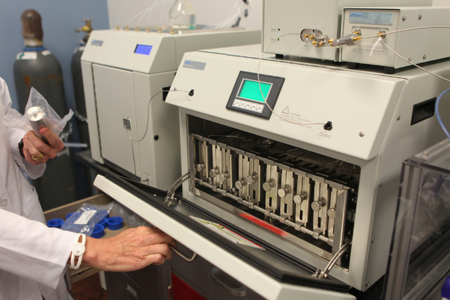 Dr. Cindy Orser, chief science officer for DigiPath Labs, shows a super critical fluid extractor inside the research and development room at the DigiPath Labs facility in Las Vegas Wednesday, Apri ...
