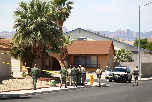 Las Vegas police investigate an officer-involved shooting on the 6300 block of Blue Jay Way, near Oakey and Jones boulevards in Las Vegas on Wednesday, April 29, 2015, 2015. Police were respondin ...