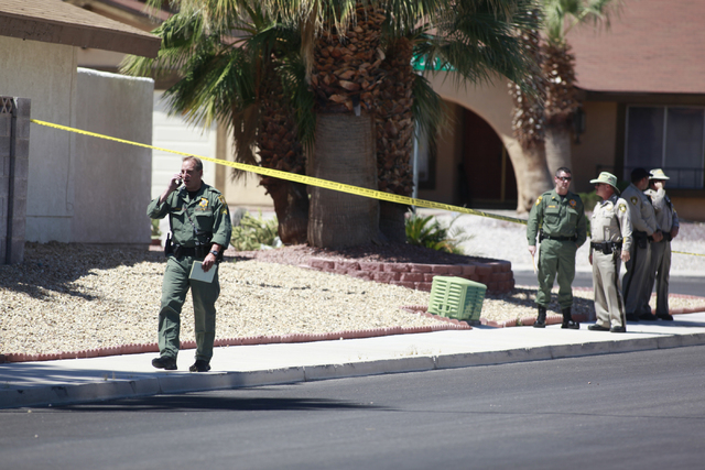 Las Vegas police investigate an officer-involved shooting on the 6300 block of Blue Jay Way, near Oakey and Jones boulevards in Las Vegas on Wednesday, April 29, 2015. Police were responding to an ...
