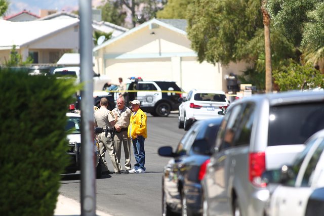Las Vegas police investigate an officer-involved shooting on the 6300 block of Blue Jay Way, near Oakey and Jones boulevards in Las Vegas on Wednesday, April 29, 2015. Police were responding to an ...