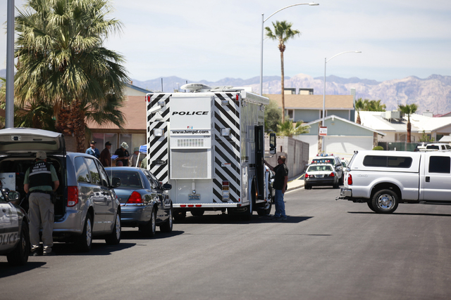 Las Vegas police investigate an officer-involved shooting on the 6300 block of Blue Jay Way, near Oakey and Jones boulevards in Las Vegas on Wednesday, April 29, 2015. Police were responding to an ...