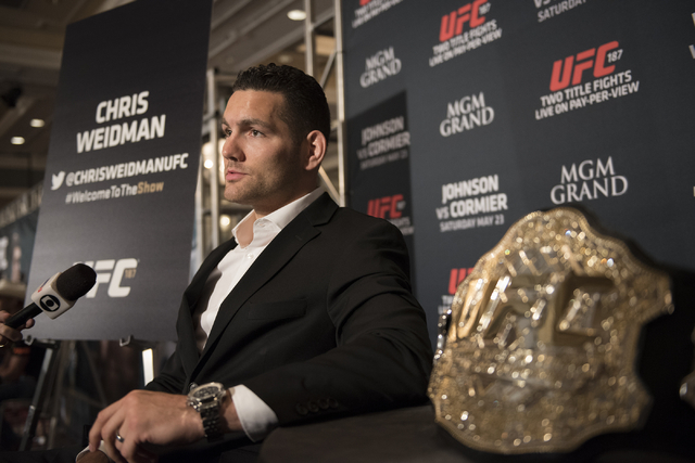 UFC middleweight champion Chris Weidman answers questions during media day before competing at UFC 187 from the MGM Grand hotel-casino in Las Vegas on Thursday, May 21, 2015. (Martin S. Fuentes/La ...
