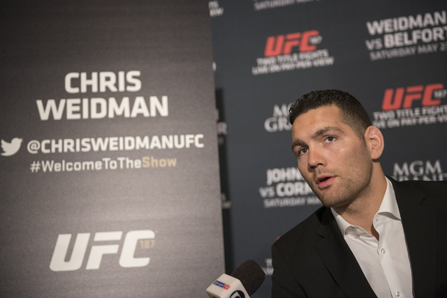UFC middleweight champion Chris Weidman answers questions during media day before competing at UFC 187 from the MGM Grand hotel-casino in Las Vegas on Thursday, May 21, 2015. (Martin S. Fuentes/La ...