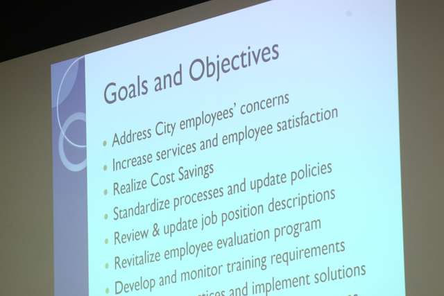 A slide is seen during an agenda item about the possibility of the city outsourcing it's human resources department to a third party during a city council meeting at North Las Vegas City Hall on W ...