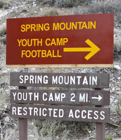 The Spring Mountain Youth Camp sign is seen on Wednesday, April 22, 2015. Professional boxers and boxing referees visited the camp, where young men ages 12 to 18 are working to turn their lives ar ...