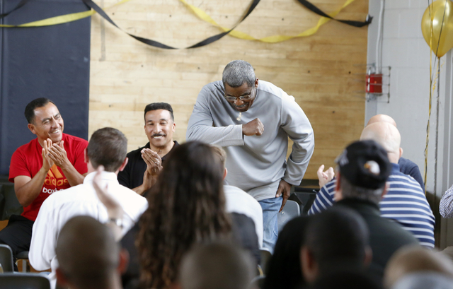 Veteran referee Robert Byrd takes a bow as he is introduced at the Spring Mountain Youth Camp Wednesday, April 22, 2015.  Professional boxers and boxing referees visited the camp, where young men  ...