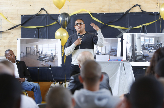 Boxer Fernando Vargas speaks to youth at the Spring Mountain Youth Camp Wednesday, April 22, 2015, as Clark County Commissioner Lawrence Weekly, left, looks on. Professional boxers and boxing ref ...