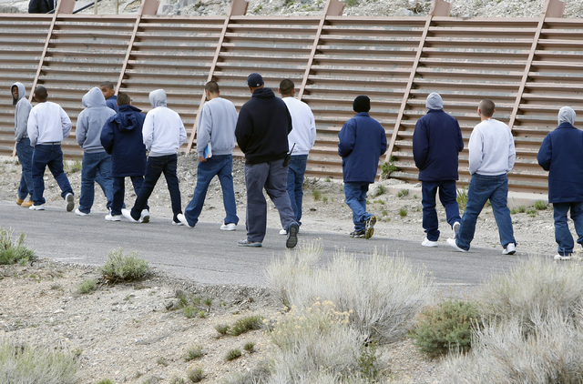 Youth walk to their camp after meeting with professional boxers and referees at the Spring Mountain Youth Camp Wednesday, April 22, 2015. Professional boxers and boxing referees visited the camp, ...
