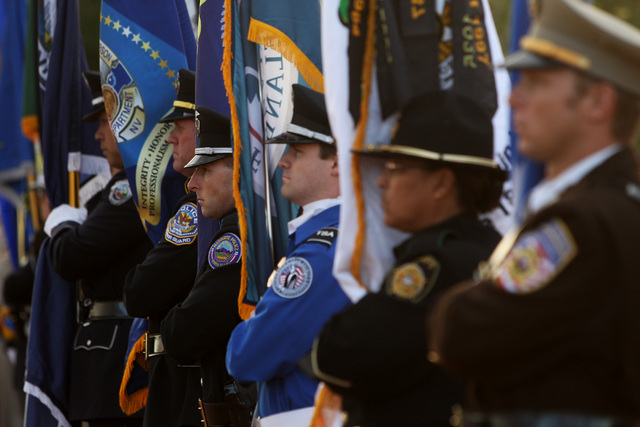 Members of a color guard stand at attention during a memorial Thursday, May 21, 2015, for Metro officers Alyn Beck and Igor Soldo who were killed in the line of duty nearly a year ago. (Sam Morris ...