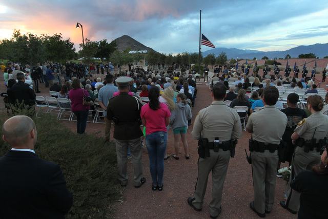 Law enforcement officers, families and supporters gather for a memorial Thursday, May 21, 2015, for Metro officers Alyn Beck and Igor Soldo who were killed in the line of duty nearly a year ago. ( ...