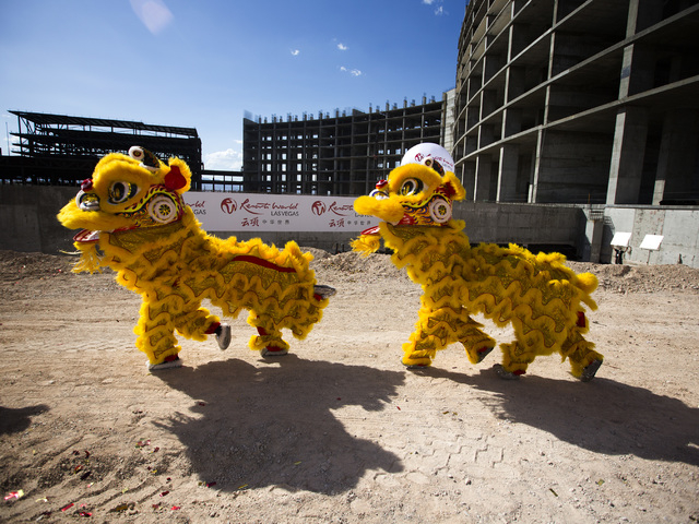 Members of the Resorts World Lion Dancers perform during the groundbreaking of the $4 billion Resorts World Las Vegas resort property, the site of the former Stardust hotel-casino on Tuesday, Ma ...